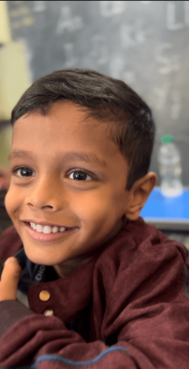 Child smiling in school